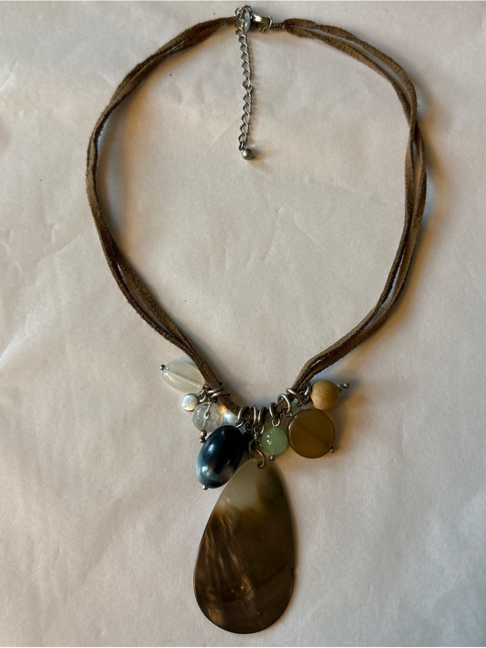 Lia Sophia Genuine beaded necklace on suede band. 16-19”